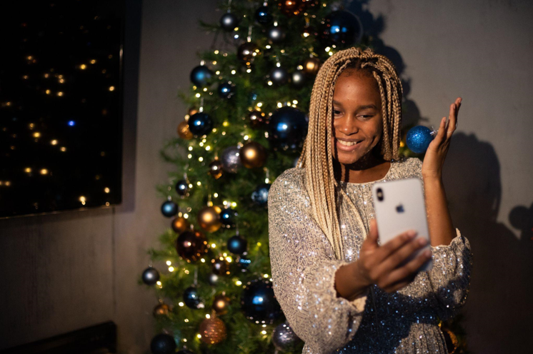 The Magic of Prelit Christmas Trees: Adorned with Snowflakes and Mistletoe